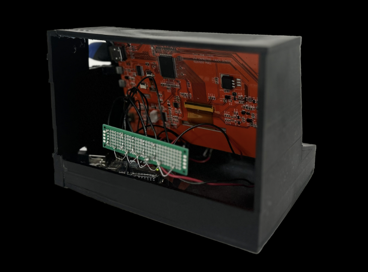Back view of the cabinet showing the screen's circuit board, the perfboard and the Arduino